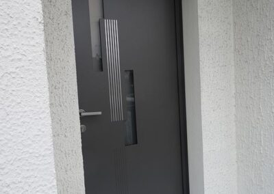 Rénovation porte entrée veigné